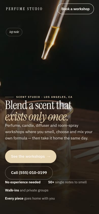 The same page on a phone, with the headline, the workshop button and the studio phone number stacked in a single column